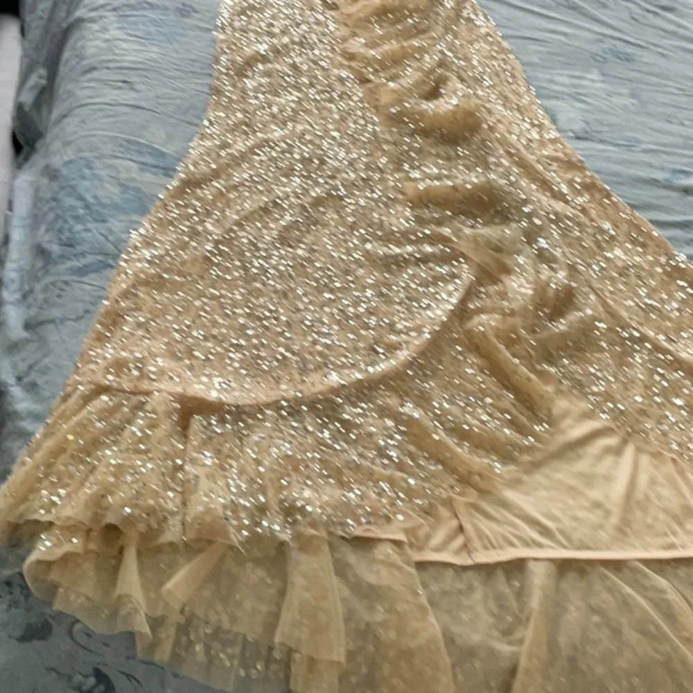 Mac Duggal Sequin Ruffle Asymmetric
Neck Tulle Gown/with Flutter Cap Sleeves - Picture 8 of 14
